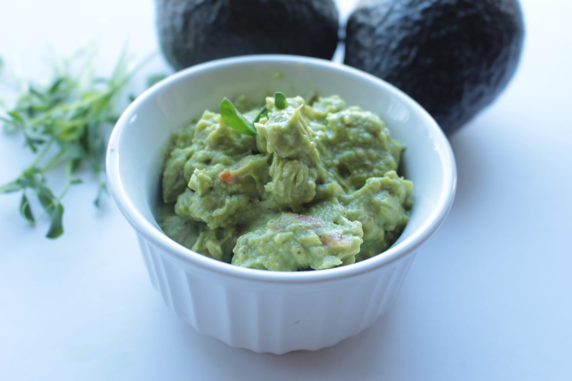 Guacamole in a white bowl