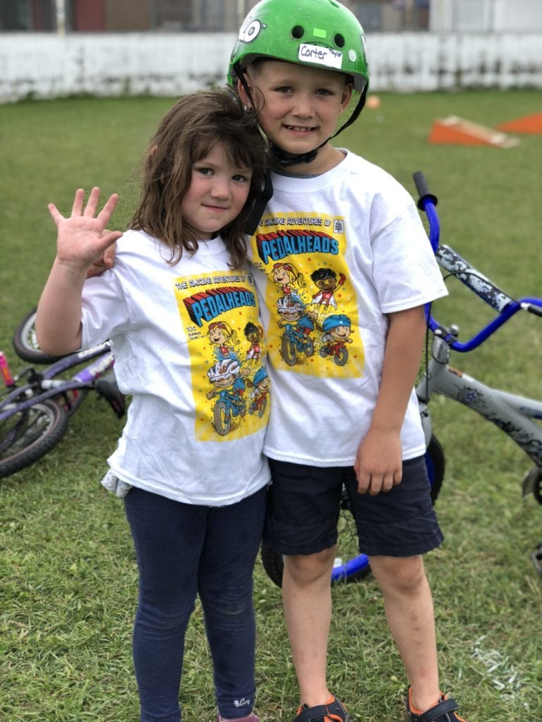 Kids in Pedalheads t-shirts posing for the camera