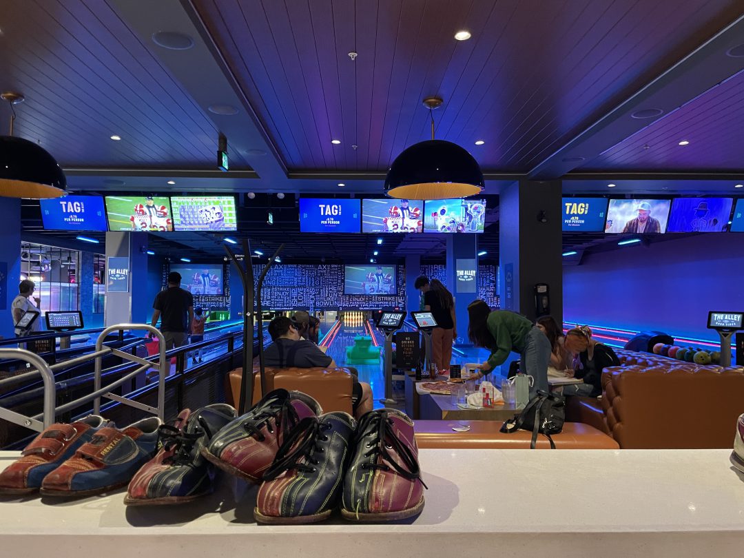 Bowling shoes in front of lanes at The Alley in Fort McMurray