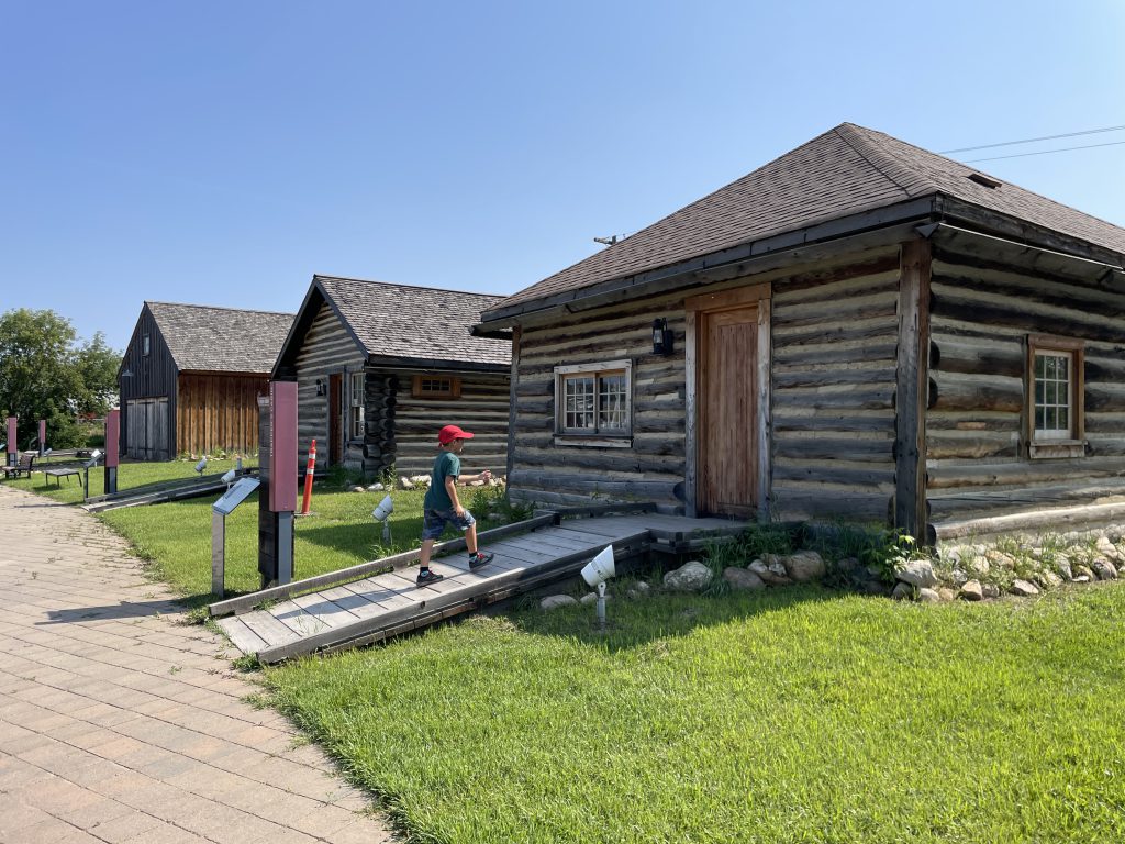 Exterior of some log cabins at Heritage Village in Fort McMurray