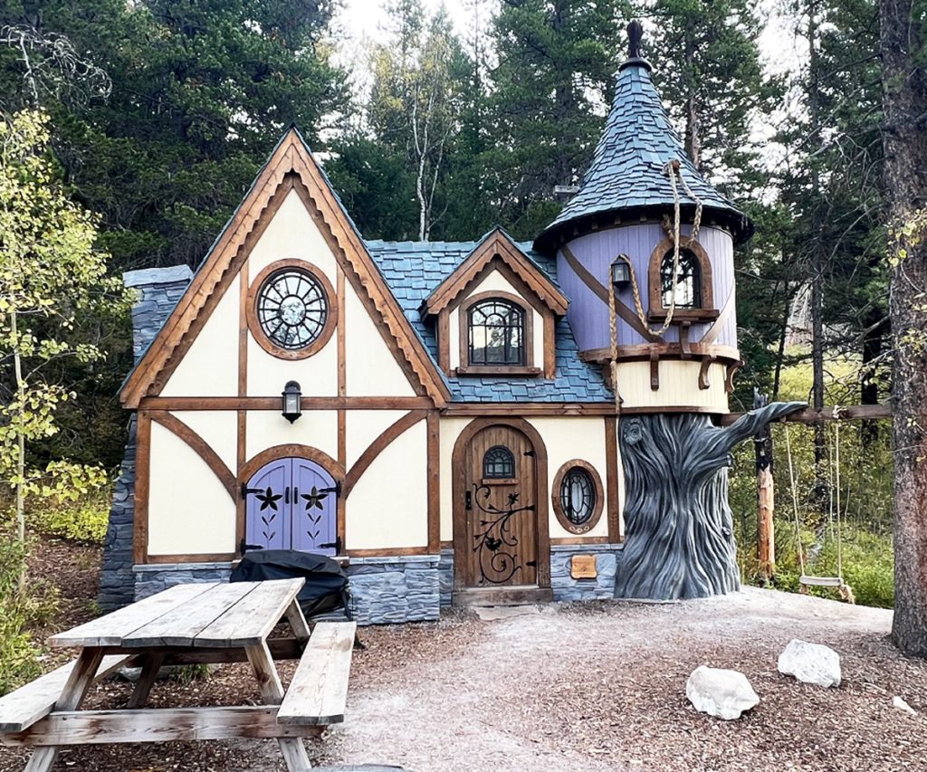 Exterior of Rapunzel's Cottage at Charmed Resorts in Crowsness Pass