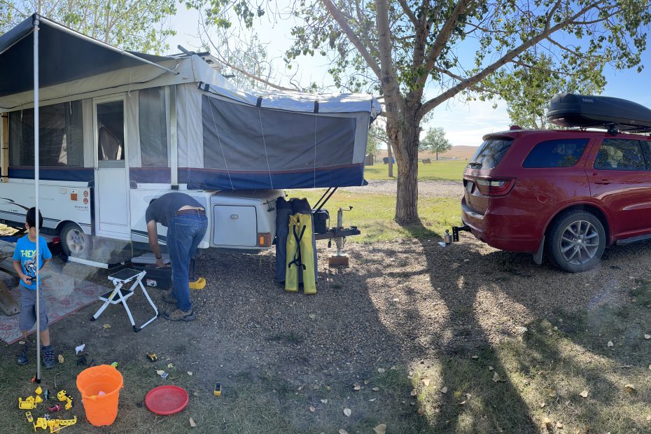 Tent trailer set up in a Campsite at Michichi Dam Campground near Drumheller